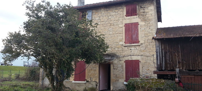 Rehabilitation et extension d'une maison d'habitation en bureaux