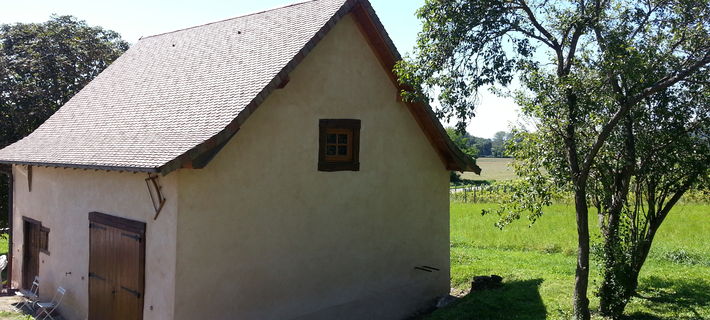 Rénovation d'une maison Dauphinoise et ses annexes en pierre et pisé .