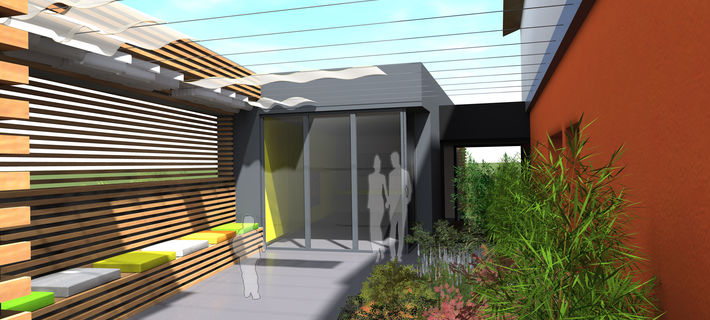 Extension en ossature bois et verre ouvert sur un jardin privatif patio